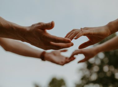 two people holding hands